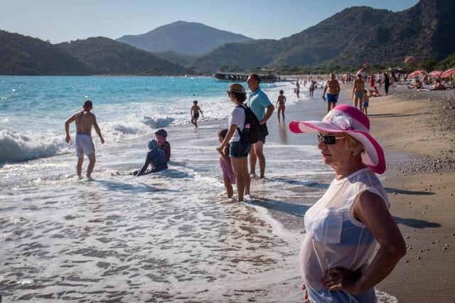 Tourists enjoy the beach in Oludeniz, Turkey (Photo: Chris McGrath/Getty Images)