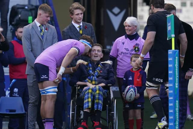 Former Scotland player Doddie Weir with Jamie Ritchie ahead of the Autumn International match at BT Murrayfield Stadium, Edinburgh. Picture date: Sunday November 13, 2022.