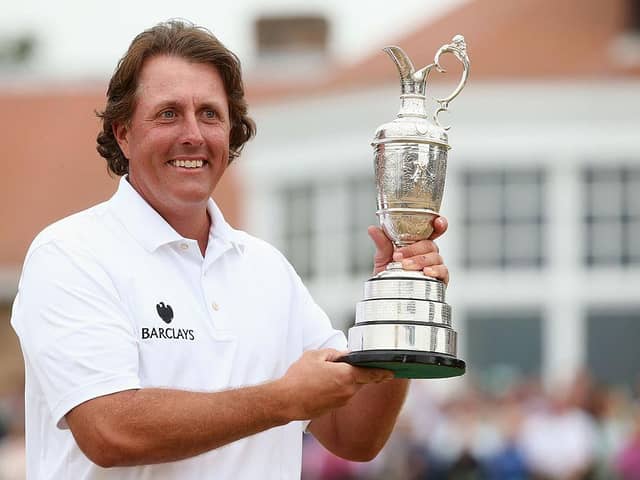 Phil Mickelson holds the Claret Jug after winning the 142nd Open Championship at Muirfield in 2013. Picture: Andrew Redington/Getty Images.