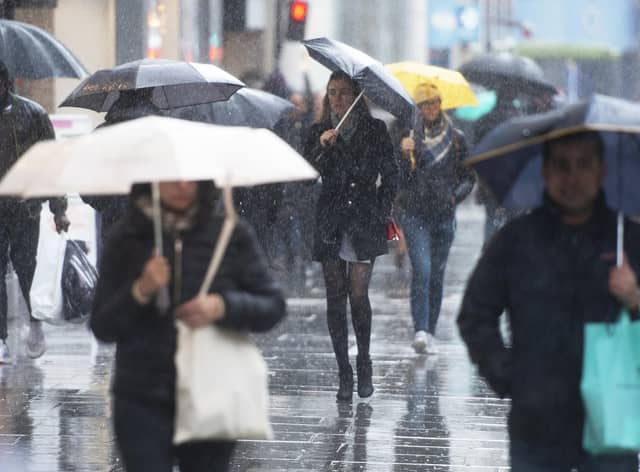 Shoppers hit the high street last month leading to a modest rise in sales but the outlook for consumer spending remains stormy.