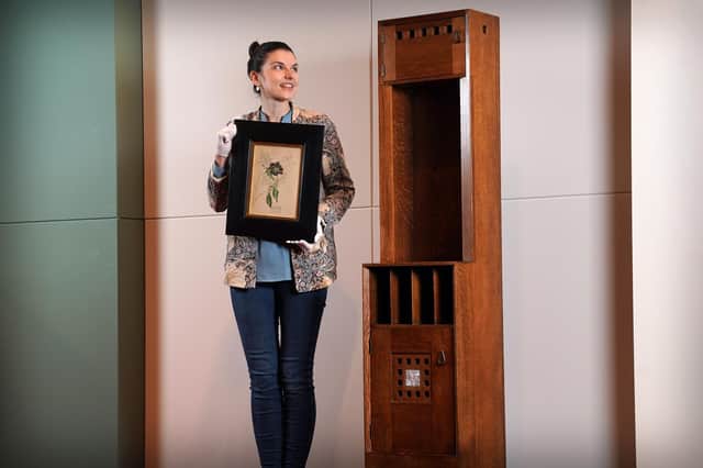 Design specialist Olivia Ross with the rare Mackintosh pieces. Stewart Attwood/Lyon & Turnbull