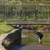 People have been spending leisure time in rivers rather than at the beach due to recent pollution alerts (Picture: Ian Forsyth/Getty Images)