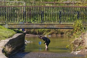 People have been spending leisure time in rivers rather than at the beach due to recent pollution alerts (Picture: Ian Forsyth/Getty Images)