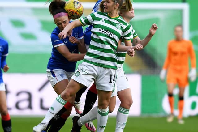 GLASGOW, SCOTLAND - APRIL 21: Sarah Teegarden (front) competes for the ball in the air during a SWPL match between Celtic and Rangers at Celtic Park, on April 21, 2021, in Glasgow, Scotland. (Photo by Craig Foy / SNS Group)