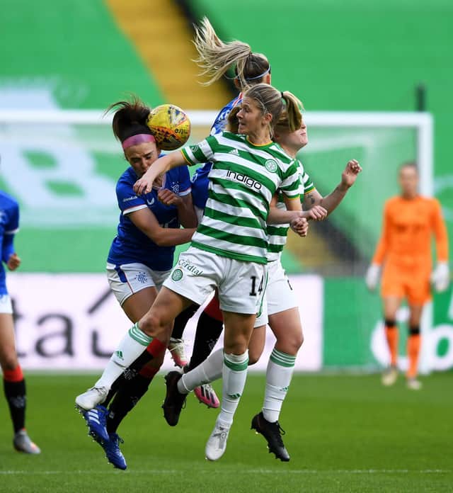 GLASGOW, SCOTLAND - APRIL 21: Sarah Teegarden (front) competes for the ball in the air during a SWPL match between Celtic and Rangers at Celtic Park, on April 21, 2021, in Glasgow, Scotland. (Photo by Craig Foy / SNS Group)