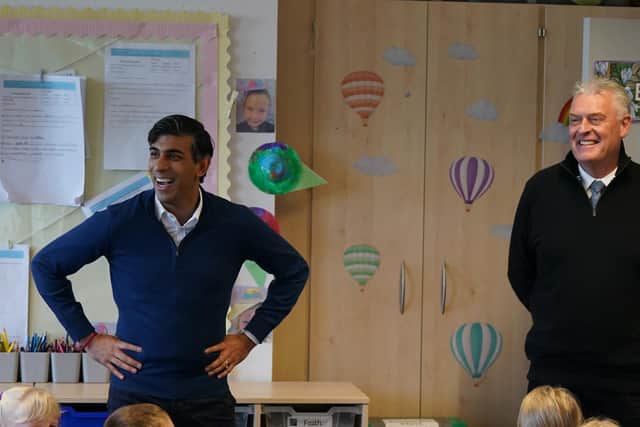 Prime Minister Rishi Sunak and his former deputy party chair Lee Anderson.
