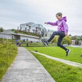 Connie Rutherford, 12 and Edward Renwick 10 do Parkour in Holyrood Park.