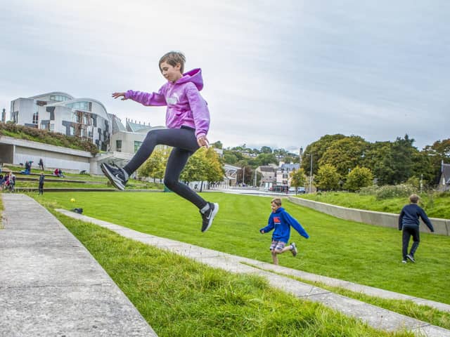 Connie Rutherford, 12 and Edward Renwick 10 do Parkour in Holyrood Park.