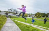 Connie Rutherford, 12 and Edward Renwick 10 do Parkour in Holyrood Park.