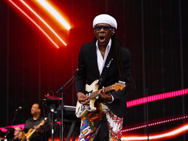 The legendary Nile Rodgers and Chic perform on the main stage (Photo by Jeff J Mitchell/Getty Images)