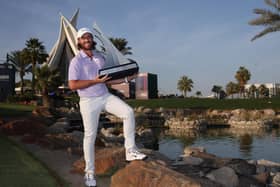 Dubai-based Tommy Fleetwood poses with the trophy after winning the Dubai Invitational at Dubai Creek Golf and Yacht Club.Picture: Warren Little/Getty Images.