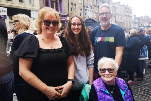 Edinburgh's Royal Mile: Charmaine, Janine, John and Nancy awaiting the arrival of the Queen's coffin