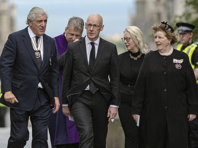 Deputy First Minister John Swinney (centre) arrives at St Giles' Cathedral, Edinburgh for a Service of Prayer and Reflection for Queen Elizabeth II.