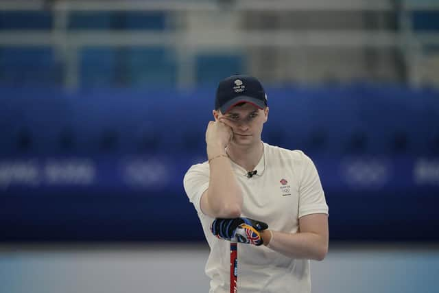 Mouat watches a throw during the match against Sweden.