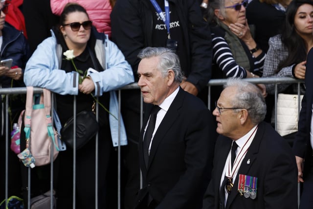Former prime minister Gordon Brown near Mercat Cross ahead of the procession of Queen Elizabeth II's coffin from the Palace of Holyroodhouse to St Giles' Cathedral, Edinburgh, following her death on Thursday. Picture date: Monday September 12, 2022.