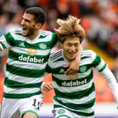 Celtic striker Kyogo Furuhashi celebrates with fellow hat-trick hero Liel Abada after scoring the opener in the 9-0 rout of Dundee United at Tannadice. (Photo by Craig Williamson / SNS Group)