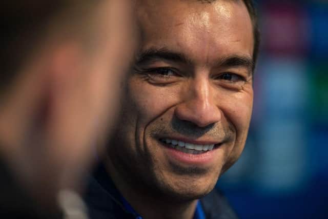 Former Feyenoord boss Gio van Bronckhorst is said to be interested (Photo credit should read OLI SCARFF/AFP via Getty Images)