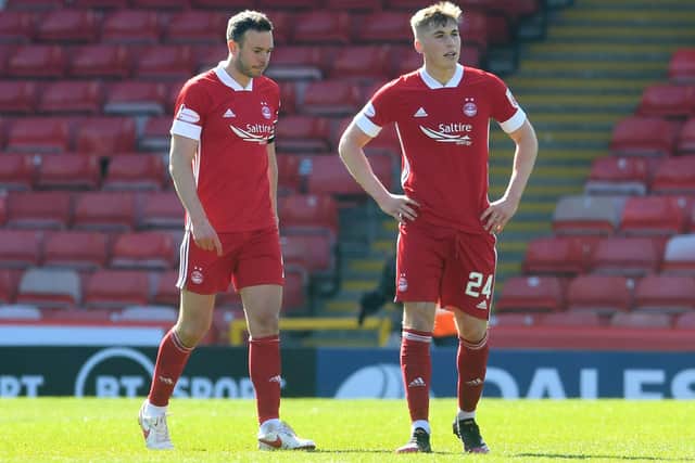 Aberdeen's Andy Considine, left, and Dean Campbell are dejected during the Scottish Cup match against Dundee United.