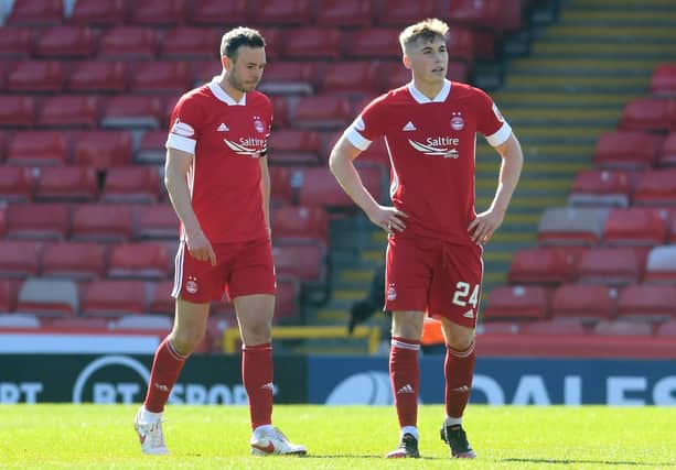 Aberdeen's Andy Considine, left, and Dean Campbell are dejected during the Scottish Cup match against Dundee United.