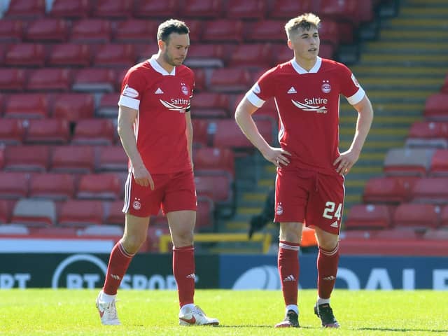 Aberdeen's Andy Considine, left, and Dean Campbell are dejected during the Scottish Cup match against Dundee United.