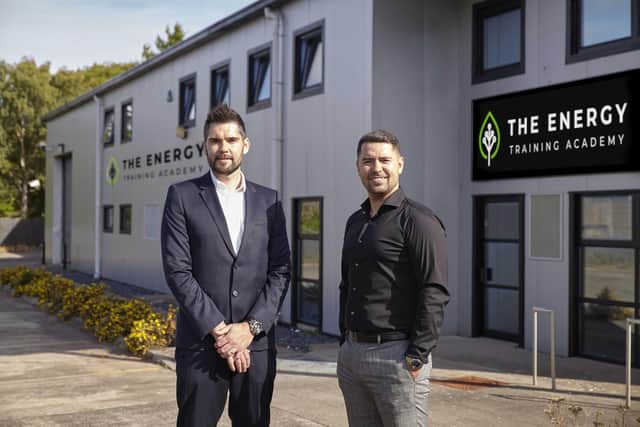 Mark Glasgow and HeatFix Scotland managing director Andrew Lamond (L)