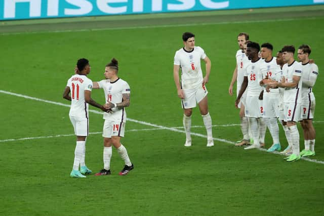 Kalvin Phillips consoles Marcus Rashford of England after his penalty miss during the UEFA European Championships final match at Wembley Stadium, London. (Picture credit: David Klein/Sportimage)