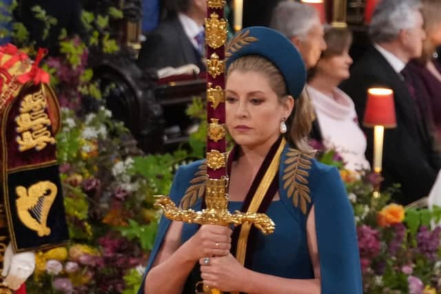 Lord President of the Council, Penny Mordaunt, carrying the Sword of State,  in the procession through Westminster Abbey ahead of the coronation ceremony of King Charles III and Queen Camilla in London. Picture: PA