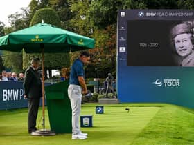 A two-minute silence in memory of Her Majesty, Queen Elizabeth II is observed at Wentworth after the resumption of the BMW PGA Championship. Picture: Octavio Passos/Getty Images.