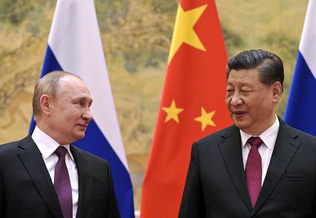 Chinese President Xi Jinping, right, and Russian President Vladimir Putin during their meeting in Beijing on 4 February 2022.  PIC: Alexei Druzhinin / Sputnik / Kremlin Pool Photo via AP