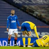 Rangers striker Kemar Roofe (centre) is booked for the challenge on Murray Davidson that has resulted in an SFA charge. (Photo by Alan Harvey / SNS Group)