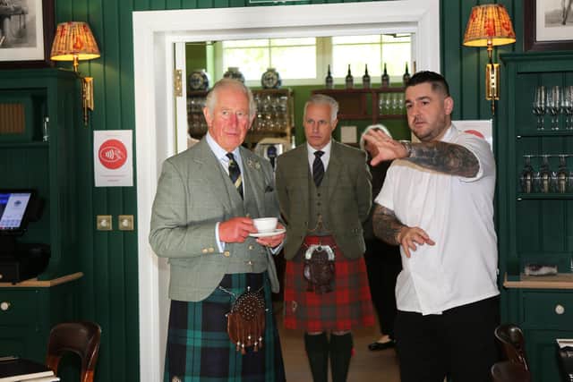 Prince Charles, the Duke of Rothesay, at the Rothesay Rooms restaurant in Ballater with Executive Chef Ross Cochrane.