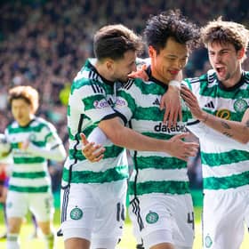 Celtic's Reo Hatate celebrates with Nicolas Kuhn and Matt O'Riley.