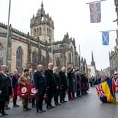 Lord Provost Robert Aldridge, First Minister John Swinney and Presiding Officer of the Scottish Parliament Alison Johnstone, along with other dignitaries, during the Remembrance Sunday ceremony at the Stone of Remembrance outside the City Chambers in Edinburgh.