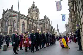 Lord Provost Robert Aldridge, First Minister John Swinney and Presiding Officer of the Scottish Parliament Alison Johnstone, along with other dignitaries, during the Remembrance Sunday ceremony at the Stone of Remembrance outside the City Chambers in Edinburgh.