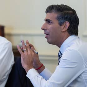 Chancellor Jeremy Hunt (left) seated next to Prime Minister Rishi Sunak
