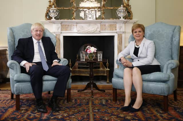 Relations between Boris Johnson Nicola Sturgeon, seen in Bute House in 2019, appear frosty (Picture: Duncan McGlynn/AFP via Getty Images)