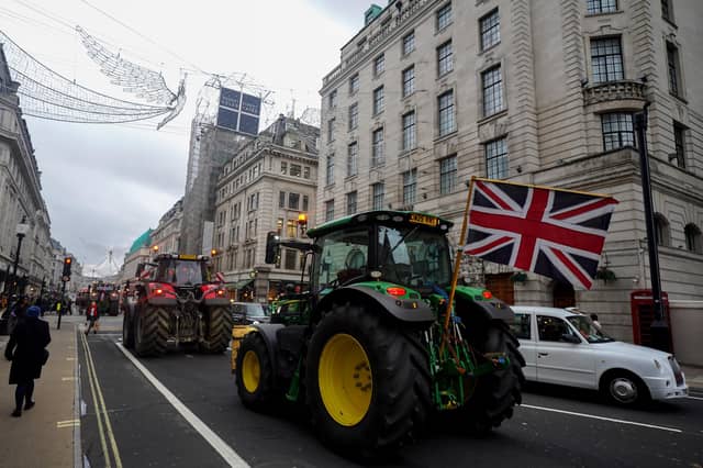 A tractor is driven through Oxford Circus in central London, during a protest by farmers. PIC: Ben Whitley/PA Wire