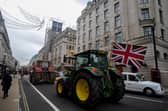A tractor is driven through Oxford Circus in central London, during a protest by farmers. PIC: Ben Whitley/PA Wire