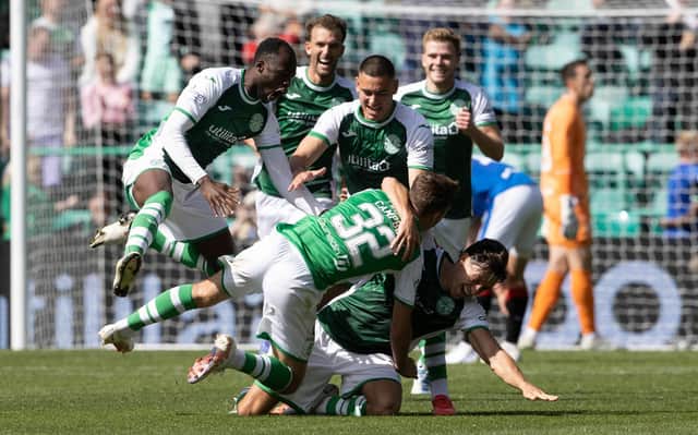 Josh Campbell is mobbed by his team-mates after levelling late on against Rangers.