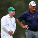 Sandy Lyle of Scotland talks with his caddie on his eventful first hole during the opening  round of the 2023 Masters. Picture: Andrew Redington/Getty Images.