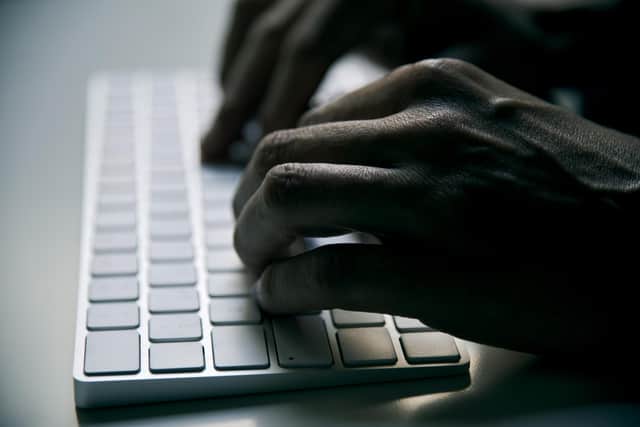 Two women have been charged in connection with the online extortion offences. Pic: Nito/Shutterstock
