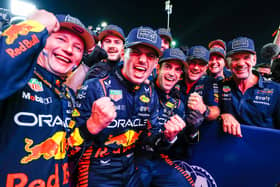 F1 World Drivers Champion Max Verstappen of the Netherlands and Oracle Red Bull Racing celebrates with his team in parc ferme after the Sprint ahead of the F1 Grand Prix of Qatar at Lusail International Circuit on October 07, 2023 in Lusail City, Qatar. (Photo by Mark Thompson/Getty Images)