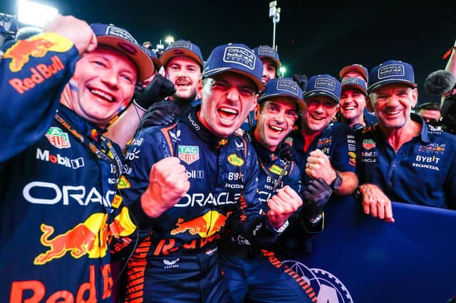 F1 World Drivers Champion Max Verstappen of the Netherlands and Oracle Red Bull Racing celebrates with his team in parc ferme after the Sprint ahead of the F1 Grand Prix of Qatar at Lusail International Circuit on October 07, 2023 in Lusail City, Qatar. (Photo by Mark Thompson/Getty Images)