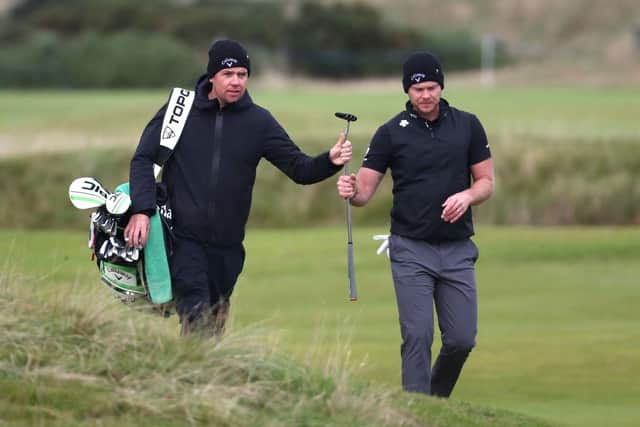 Danny Willett and caddie Jonathan Smart during a practice round for the Alfred Dunhill Links Championship at Kingsbarns Golf Links. Picture: Matthew Lewis/Getty Images.