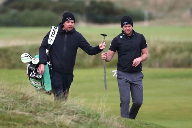 Danny Willett and caddie Jonathan Smart during a practice round for the Alfred Dunhill Links Championship at Kingsbarns Golf Links. Picture: Matthew Lewis/Getty Images.