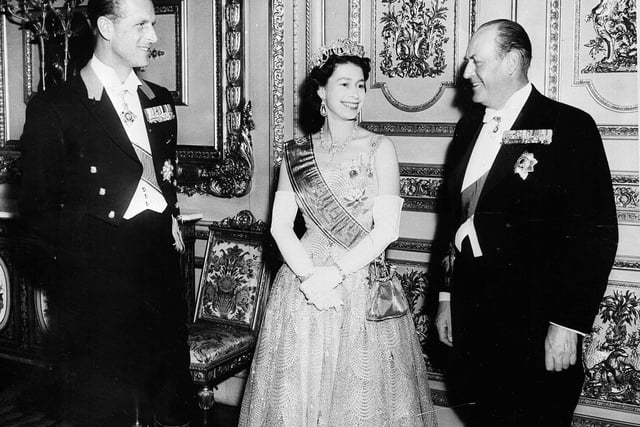 The Duke of Edinburgh, Queen Elizabeth II and King Olav of Norway at the gala performance of the play 'Rob Roy' in the Lyceum Theatre during the King's state visit in October 1962.