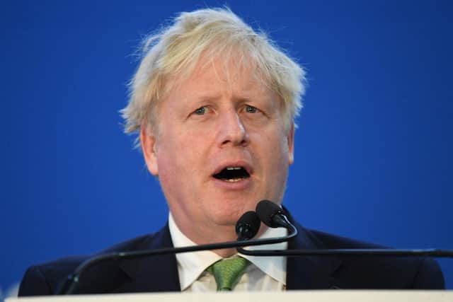 Boris Johnson has suffered a humiliating defeat in two by-elections (Photo by SIMON MAINA/AFP via Getty Images)