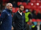 Steve Clarke's Scotland will go up against England's Gareth Southgate at Hampden next year. (Photo by JUSTIN TALLIS/POOL/AFP via Getty Images)
