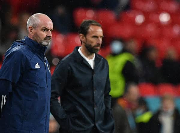Steve Clarke's Scotland will go up against England's Gareth Southgate at Hampden next year. (Photo by JUSTIN TALLIS/POOL/AFP via Getty Images)