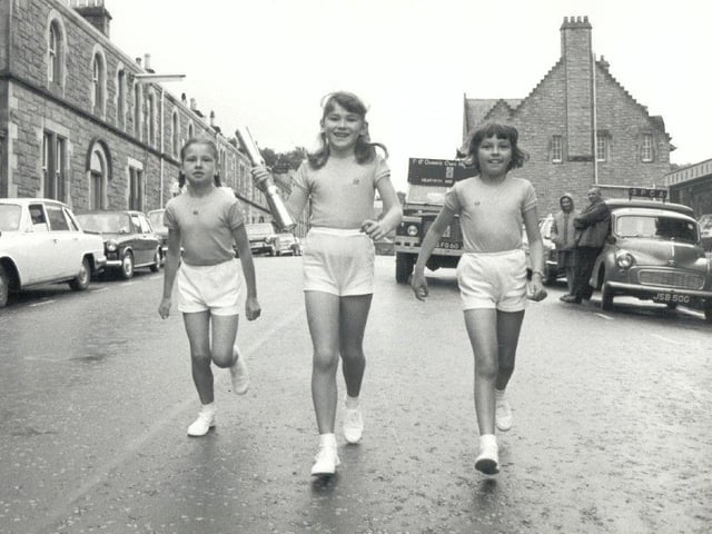 Three youngsters take part in the 1970 Queen's Baton Relay in the runup to the Edinburgh Games.